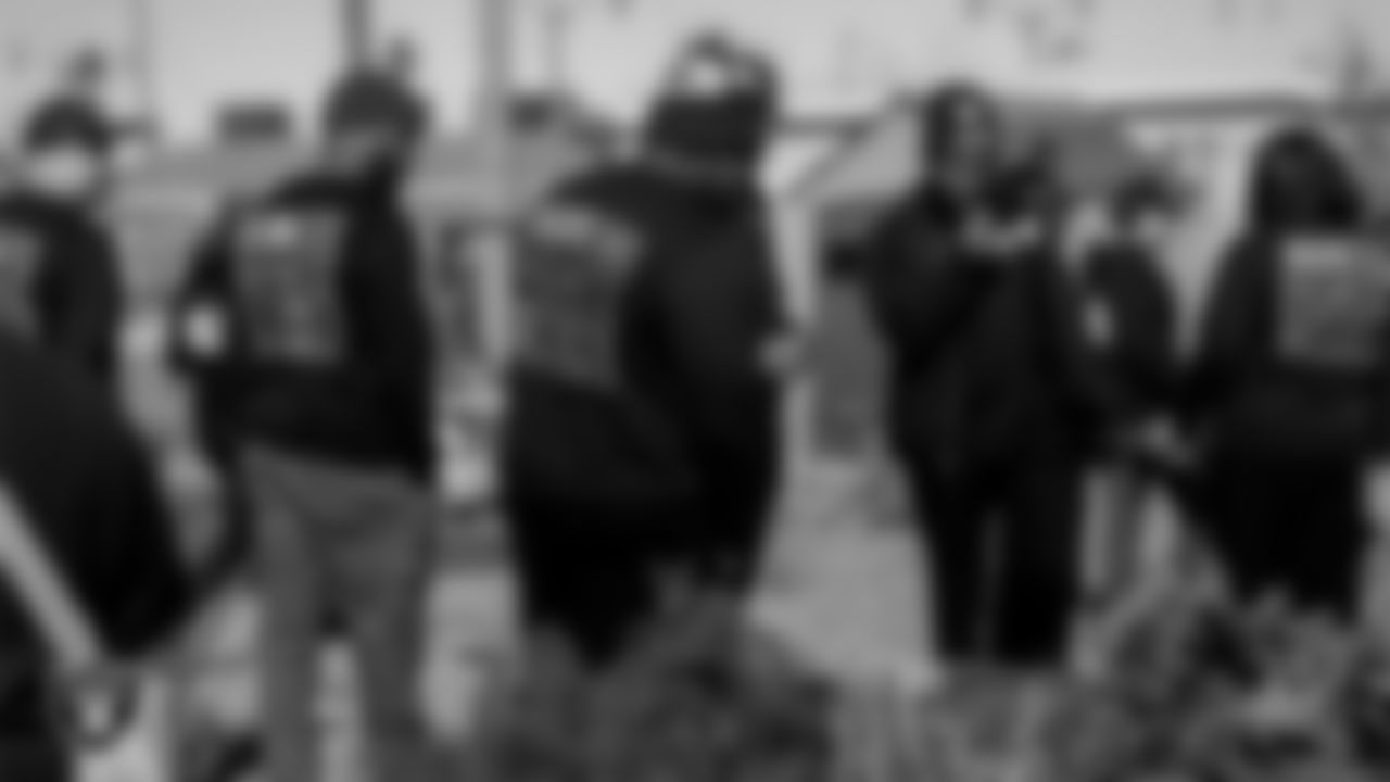 Attendees tour the Obodo Community Gardens during the Historic Westside Tour.