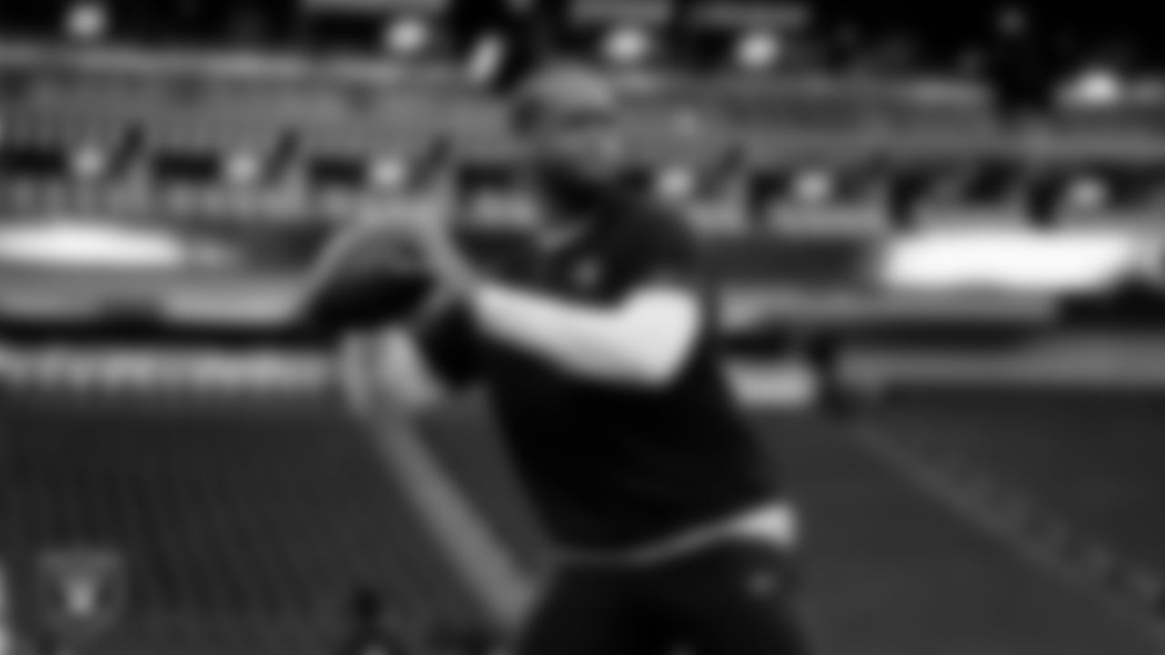 Las Vegas Raiders quarterback Geno Smith (7) warming up before the regular season home game against the Denver Broncos at Allegiant Stadium.