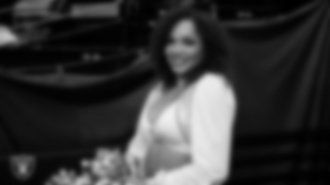 Raiderette Makenna walks through the tunnel before the regular season home game against the Kansas City Chiefs at Allegiant Stadium.