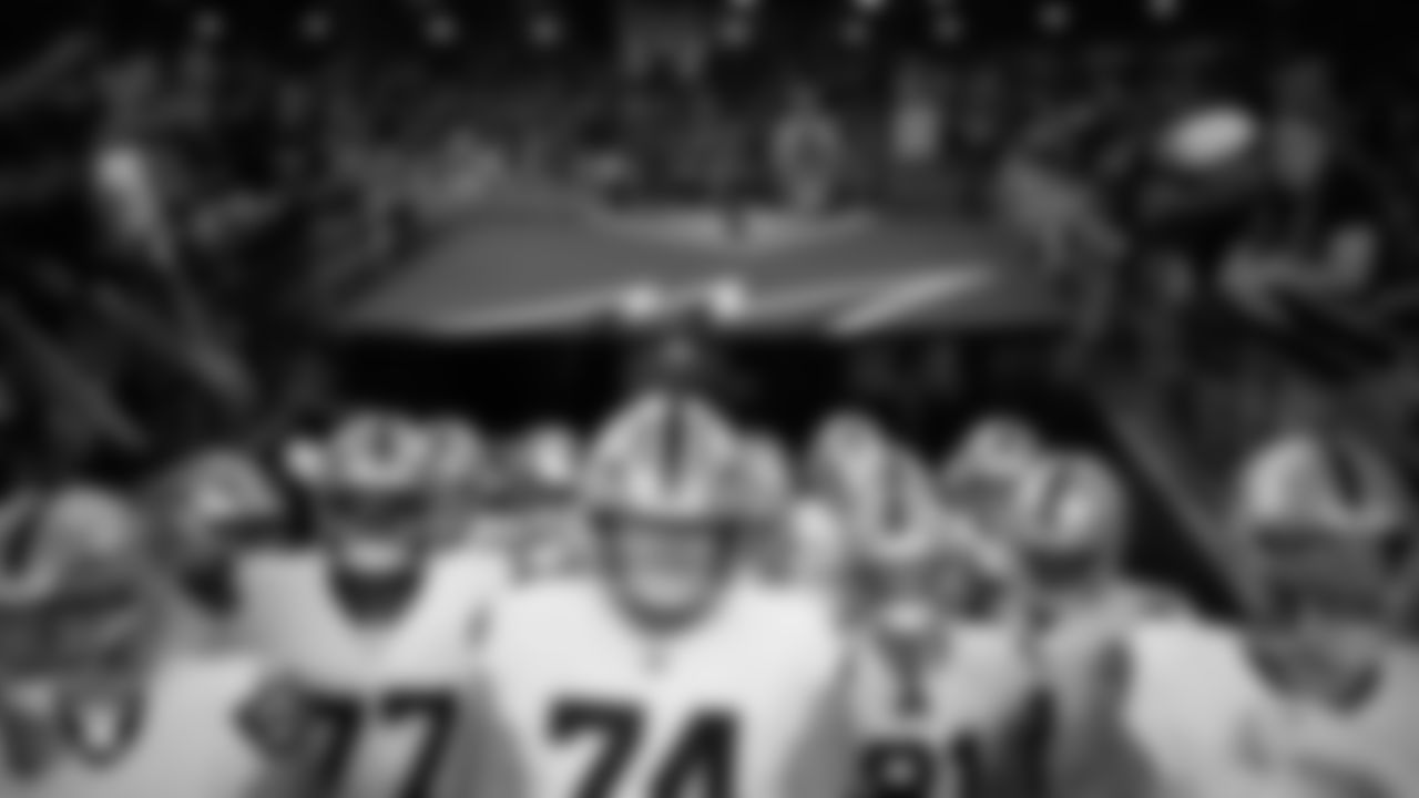 The Las Vegas Raiders wait to be introduced onto the field before the  preseason away game against the Arizona Cardinals at State Farm Stadium.