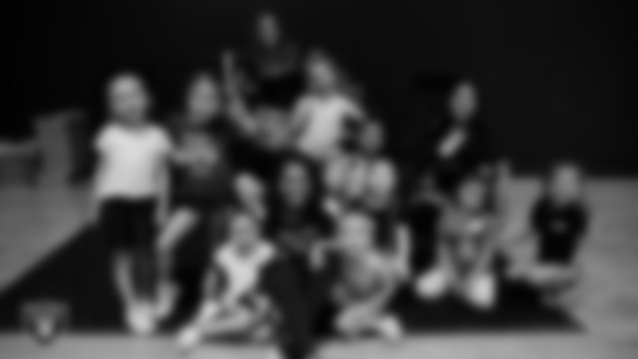 Raiderette Shayla with dancers during day two of summer camp at The Studio.