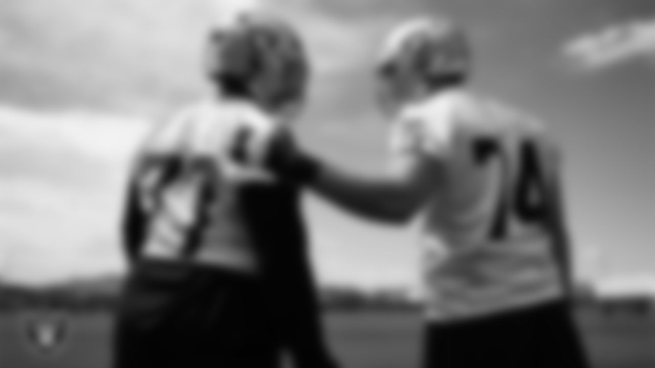Las Vegas Raiders tackle Thayer Munford Jr. (77) and tackle Kolton Miller (74) at an Organized Team Activity (OTA) at Intermountain Health Performance Center.