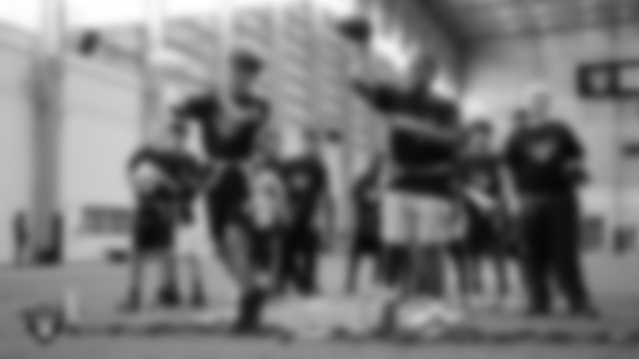 Students go through a drill during a Raiders Junior Training Camp at Intermountain Health Performance Center.