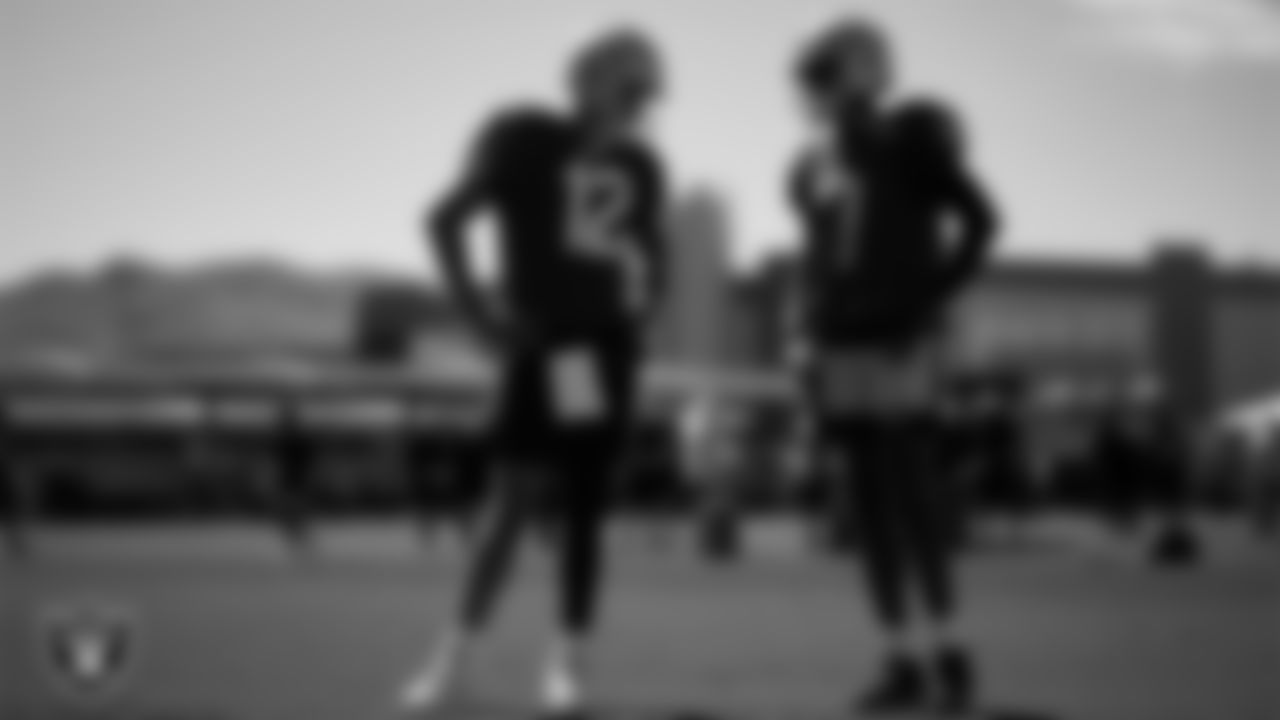 Las Vegas Raiders quarterback Aidan O'Connell (12) and quarterback Geno Smith (7) on the field for practice at 2025 Training Camp at Intermountain Health Performance Center.