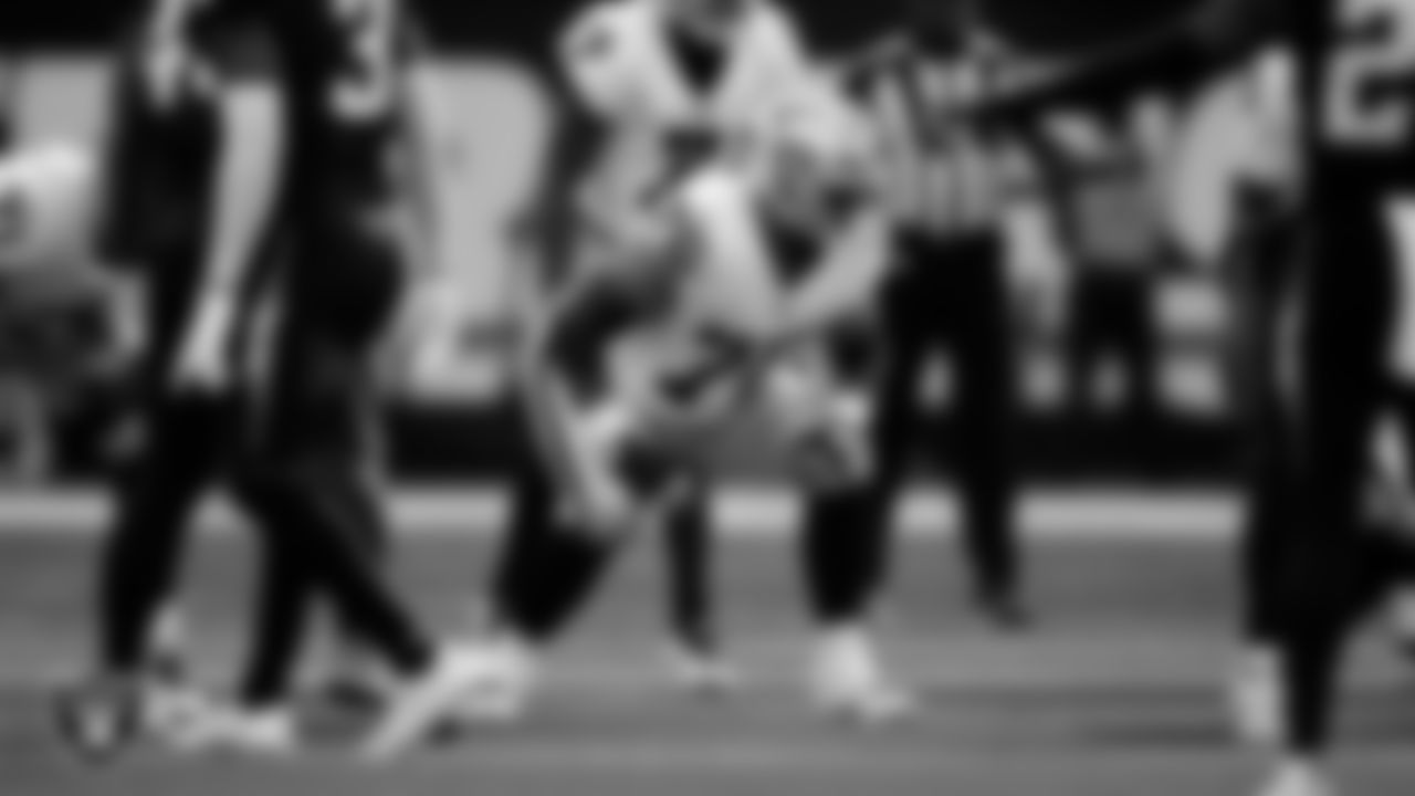 Las Vegas Raiders guard Caleb Rogers (76) lines up before the snap during the regular season away game against the Los Angeles Chargers at SoFi Stadium.