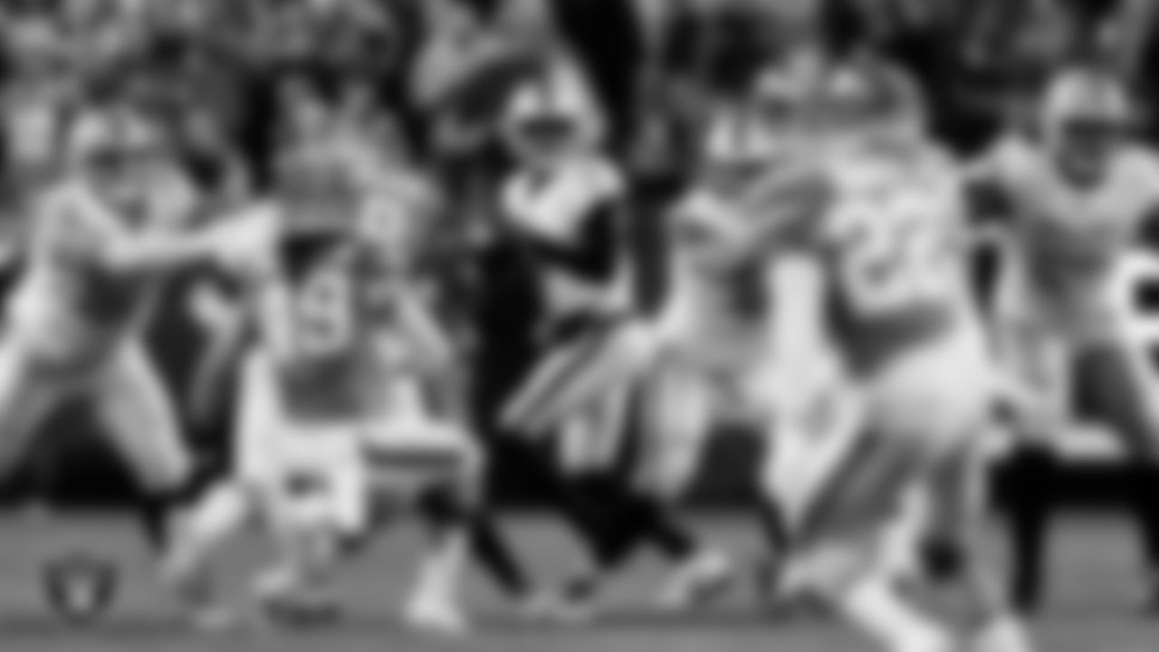 Las Vegas Raiders quarterback Geno Smith (7) during the regular season away game against the Denver Broncos at Empower Field at Mile High.