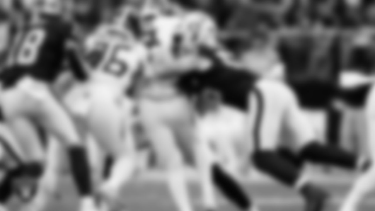 Las Vegas Raiders linebacker Cody Lindenberg (55) makes a tackle during the regular season home game against the Tennessee Titans at Allegiant Stadium.