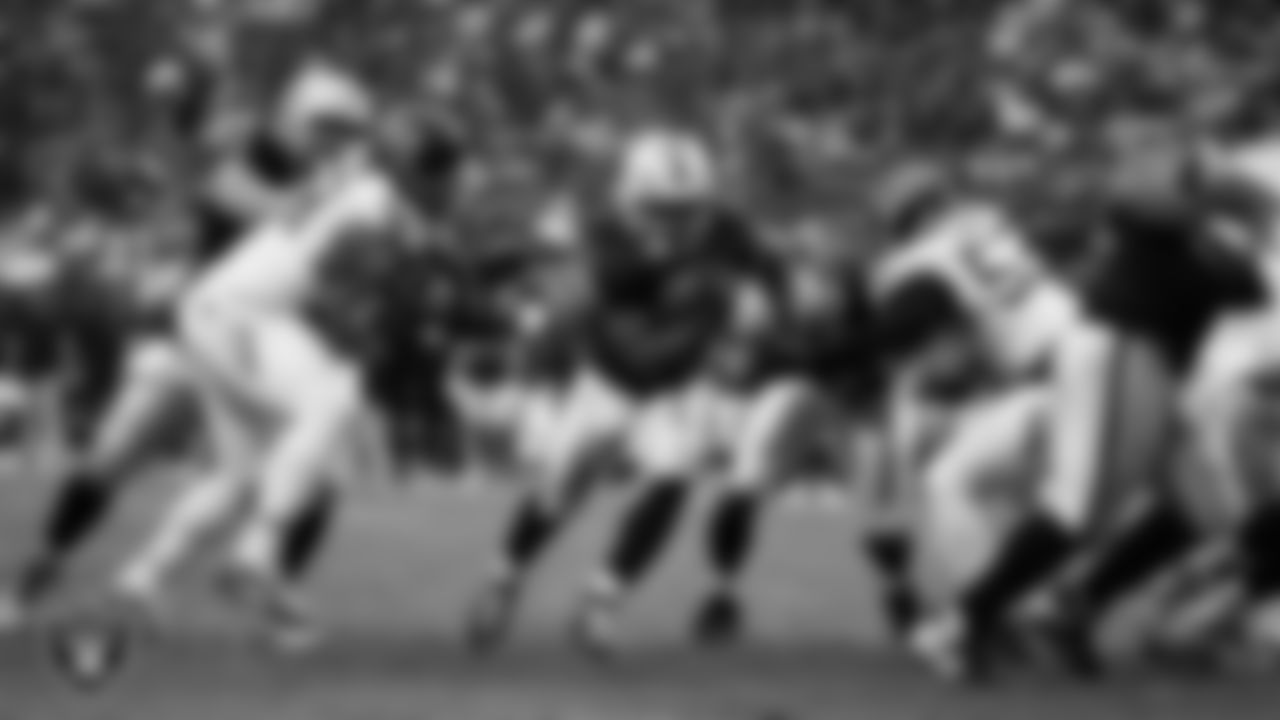 Las Vegas Raiders running back Ashton Jeanty (2) rushes for a 3-yard touchdown during the regular season home game against the Tennessee Titans at Allegiant Stadium.