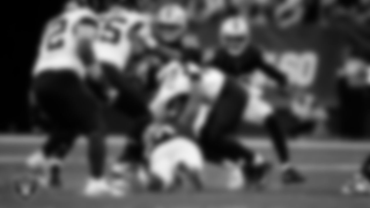 Las Vegas Raiders defensive tackle Adam Butler (69) makes a tackle during the regular season home game against the Jacksonville Jaguars at Allegiant Stadium.