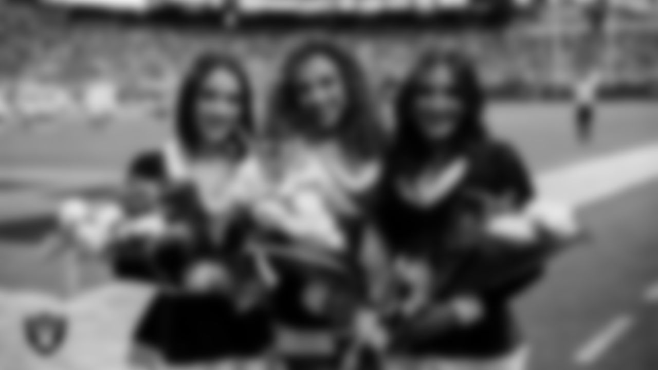 Dancer of the Year Raiderette Kylie, Raiderette of Year Raiderette Lexie and Rookie of the Year Raiderette Amanda pose for a photo during the regular season home game against the New York Giants at Allegiant Stadium.