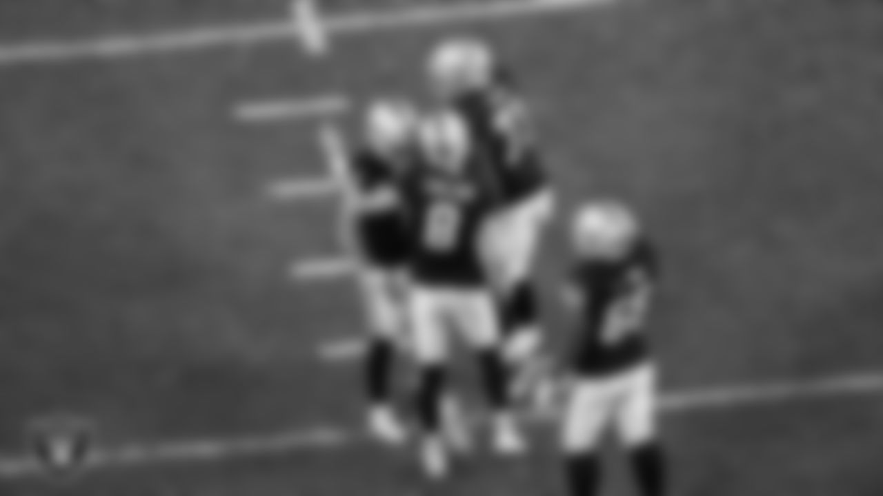 Las Vegas Raiders kicker Daniel Carlson (8) celebrates with punter AJ Cole (6) after kicking a 45-yard field goal during the regular season home game against the Dallas Cowboys at Allegiant Stadium.