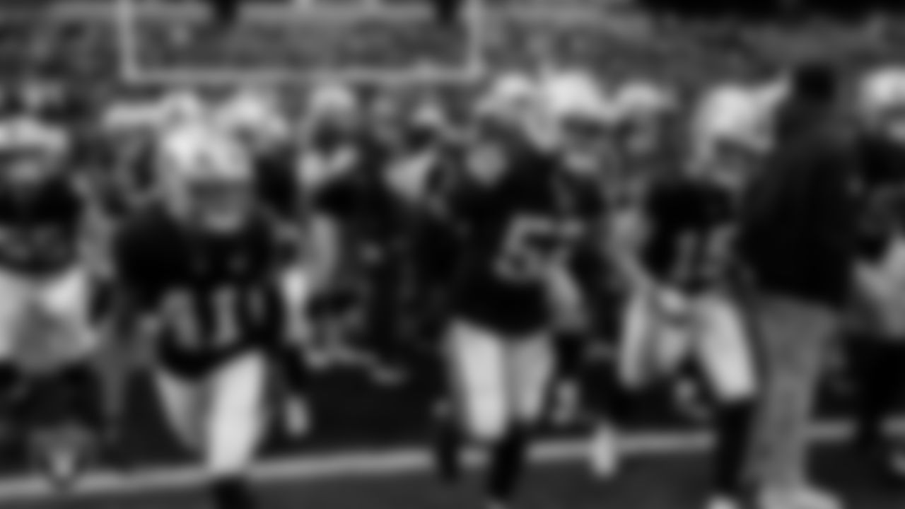 The Las Vegas Raiders warming up before the regular season home game against the New York Giants at Allegiant Stadium.