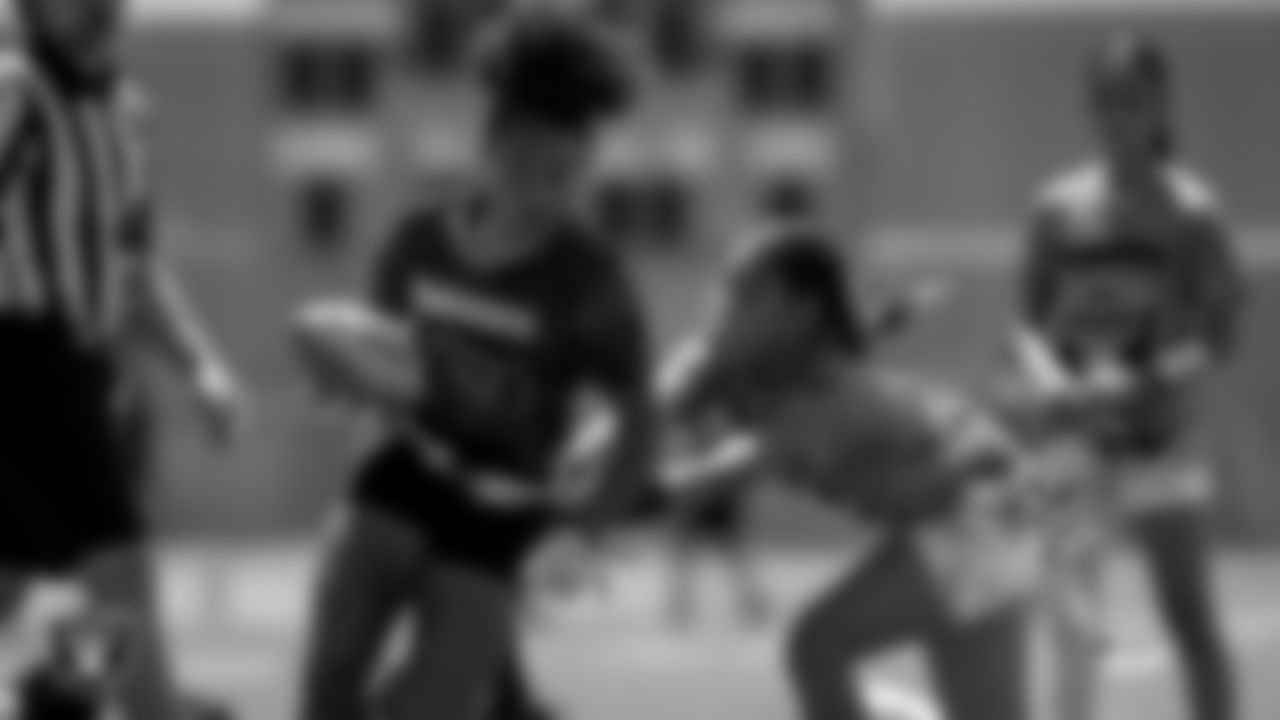 Athletes compete during a girls division Silver and Black League playoff game at Western High School.