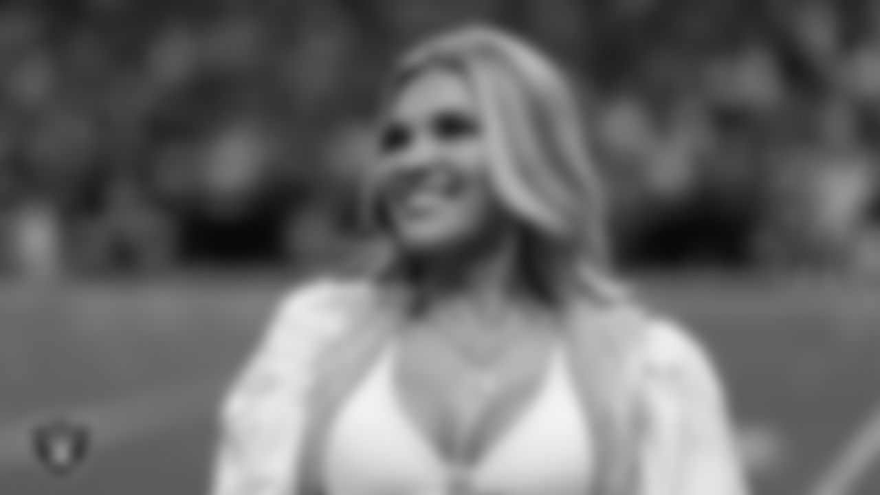 Raiderette Ali on the sidelines during the regular season home game against the Denver Broncos at Allegiant Stadium.