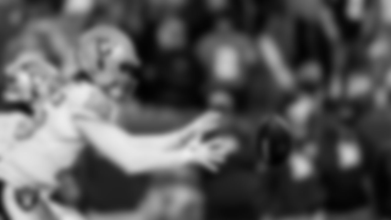 Las Vegas Raiders quarterback Kenny Pickett (15) during the regular season away game against the Denver Broncos at Empower Field at Mile High.