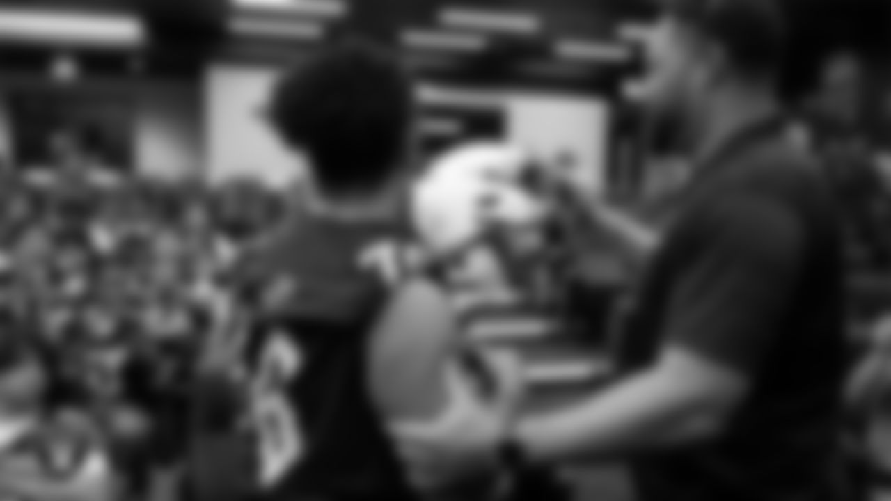 Las Vegas Raiders alumnus Teyo Johnson surprises the Cheyenne High School football team with new helmets at Intermountain Health Performance Center.