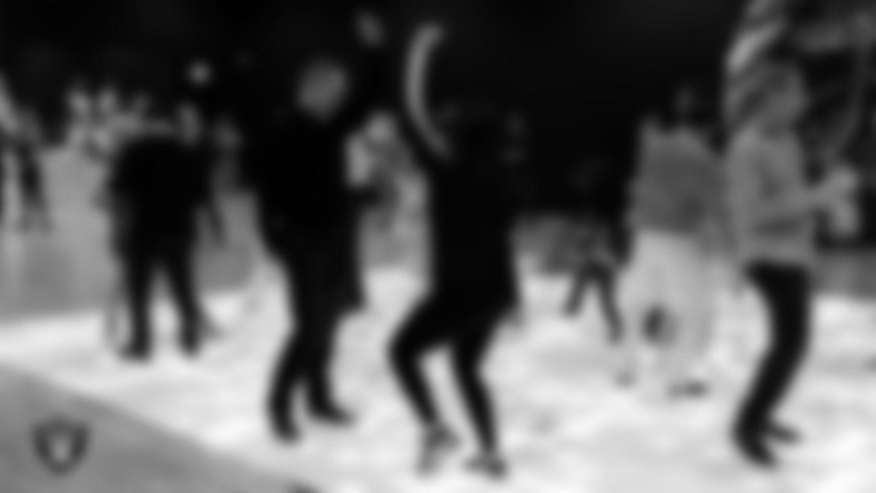 Raiderette Reagan dances with her father during the Valentine's Day Dance at The Studio.