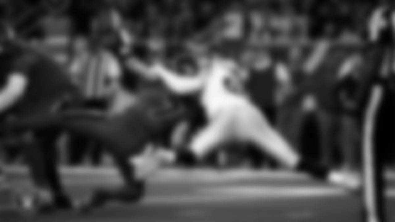 Las Vegas Raiders defensive end Maxx Crosby (98) makes a tackle during the regular season away game against the Houston Texans at NRG Stadium.