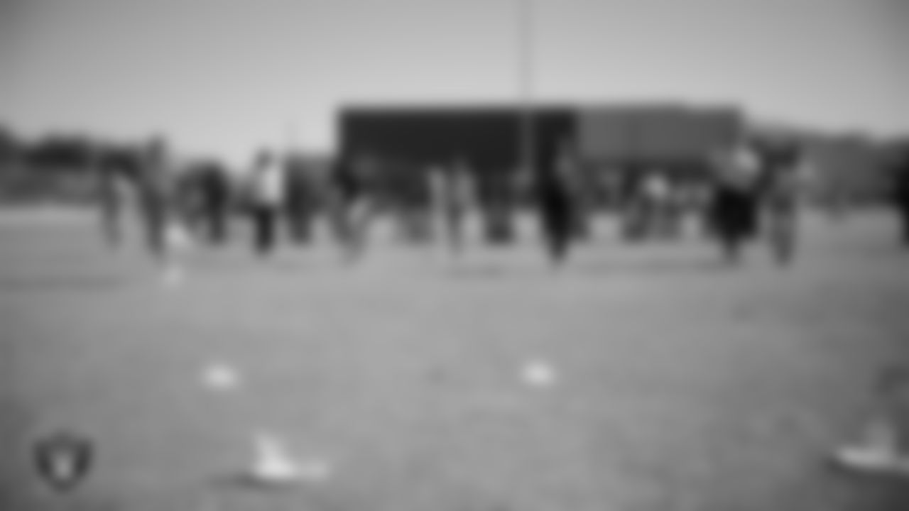 Students participate in activities while learning about flag football, nutrition and mental health during the R.U.S.H. program at J.D. Smith Middle School.