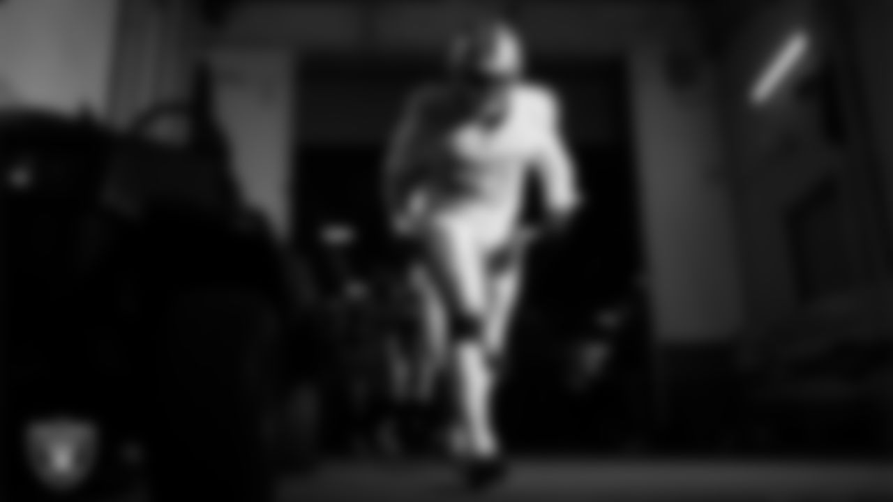 Las Vegas Raiders defensive tackle Tonka Hemingway (97) walks down the tunnel before the regular season away game against the Denver Broncos at Empower Field at Mile High.