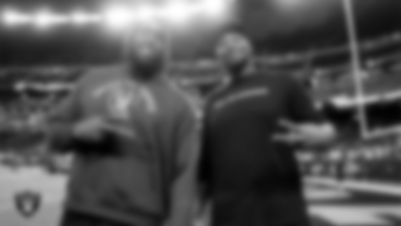 Las Vegas Raiders tackle DJ Glaze (71) and tackle Charles Grant (60) warming up before the regular season home game against the Dallas Cowboys at Allegiant Stadium.