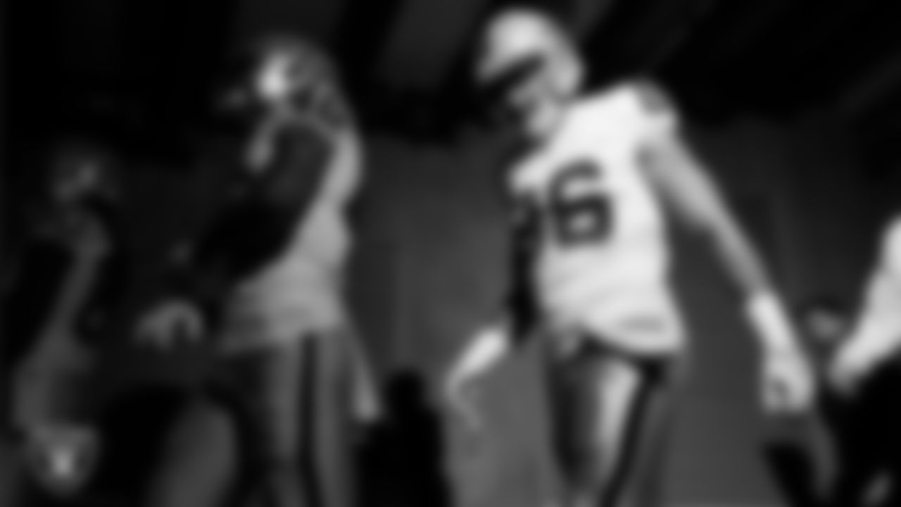 Las Vegas Raiders tight end Carter Runyon (46) and tight end Albert Okwuegbunam (86) walk down the tunnel before the regular season away game against the Indianapolis Colts at Lucas Oil Stadium.
