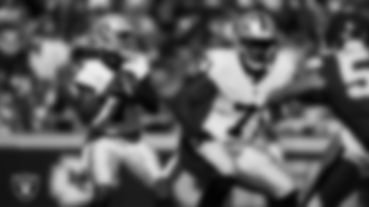 Las Vegas Raiders quarterback Geno Smith (7) looks for a receiver during the regular season away game against the Kansas City Chiefs at GEHA Field at Arrowhead Stadium.