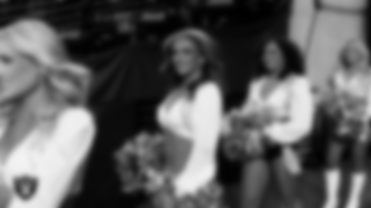 Raiderette Shelby walks through the tunnel before the regular season home game against the Los Angeles Chargers at Allegiant Stadium.