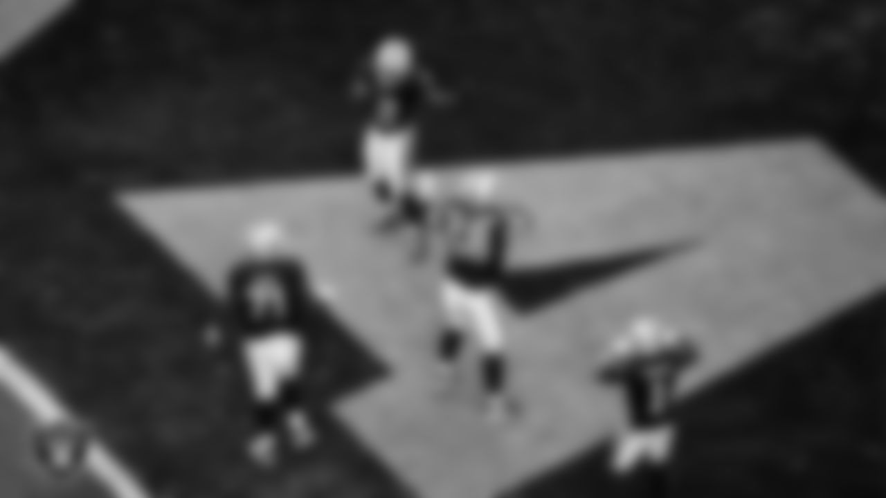 Las Vegas Raiders running back Ashton Jeanty (2) celebrates with center Jackson Powers-Johnson (58) after making an 8-yard touchdown catch during the regular season home game against the Chicago Bears at Allegiant Stadium.