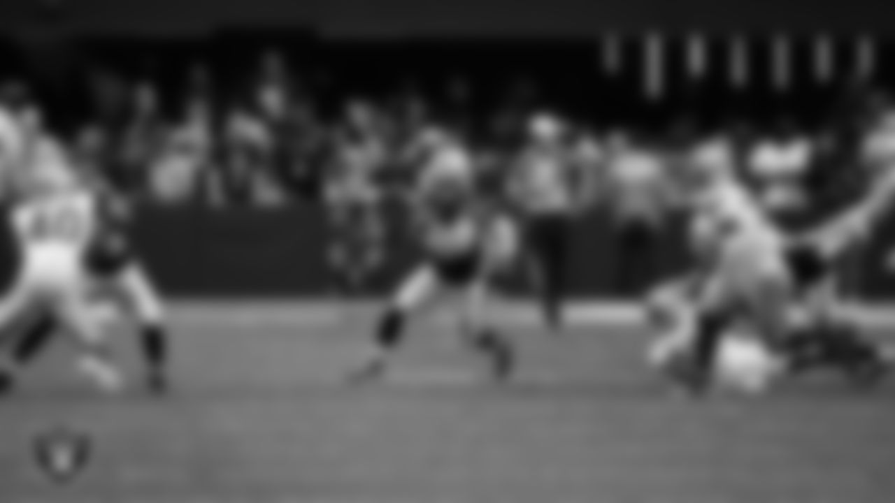 Las Vegas Raiders running back Dylan Laube (23) returns a kickoff during the preseason home game against the San Francisco 49ers at Allegiant Stadium.