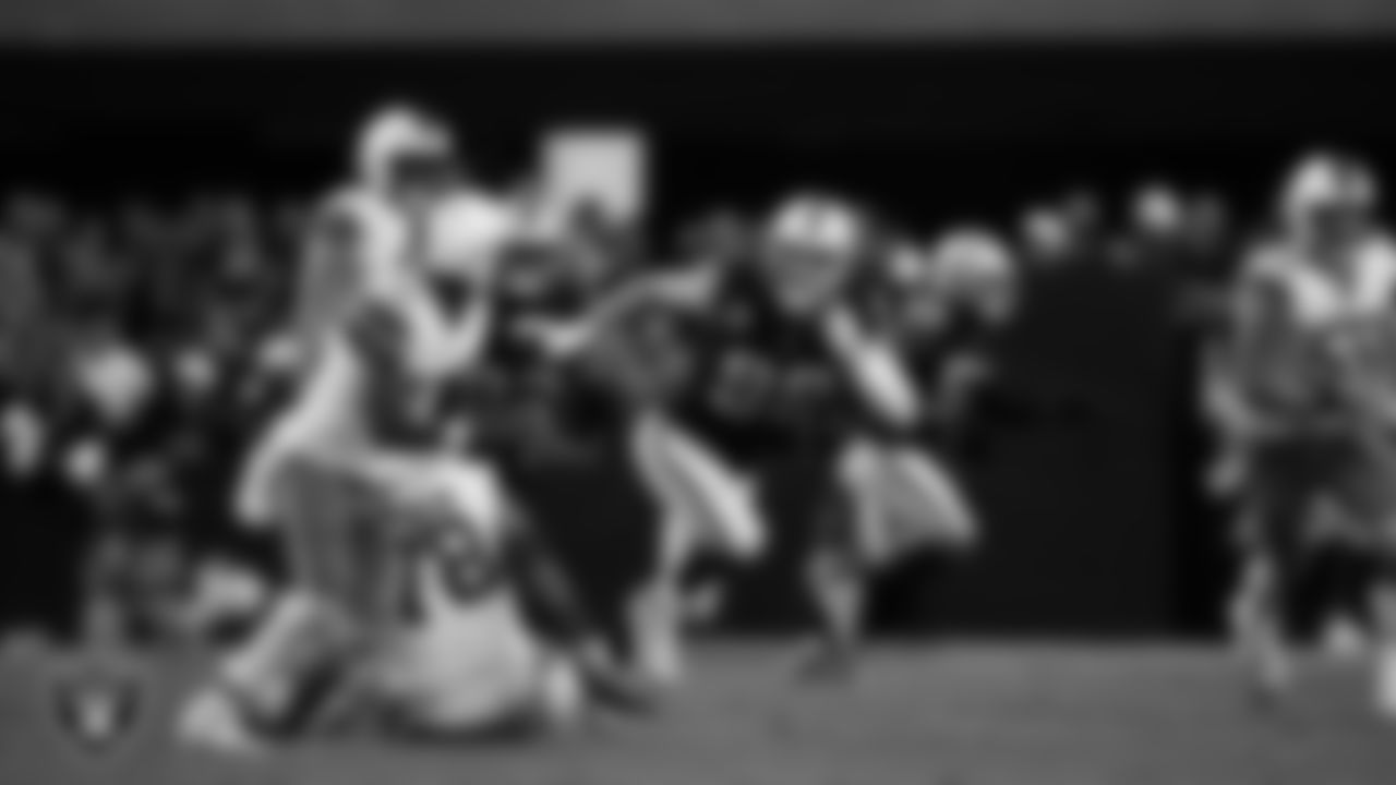 Las Vegas Raiders defensive end Maxx Crosby (98) pressures the quarterback during the regular season home game against the Cleveland Browns at Allegiant Stadium.