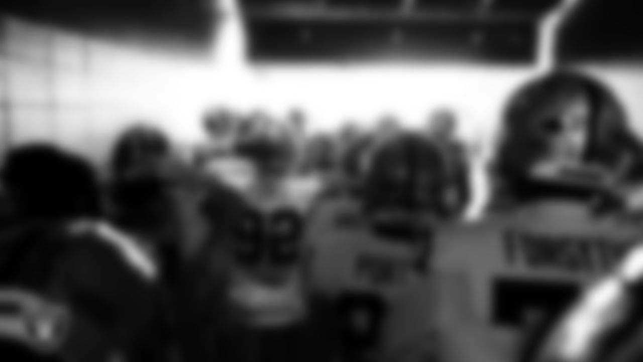 The Las Vegas Raiders wait to be introduced onto the field before the regular season away game against the Philadelphia Eagles at Lincoln Financial Field.