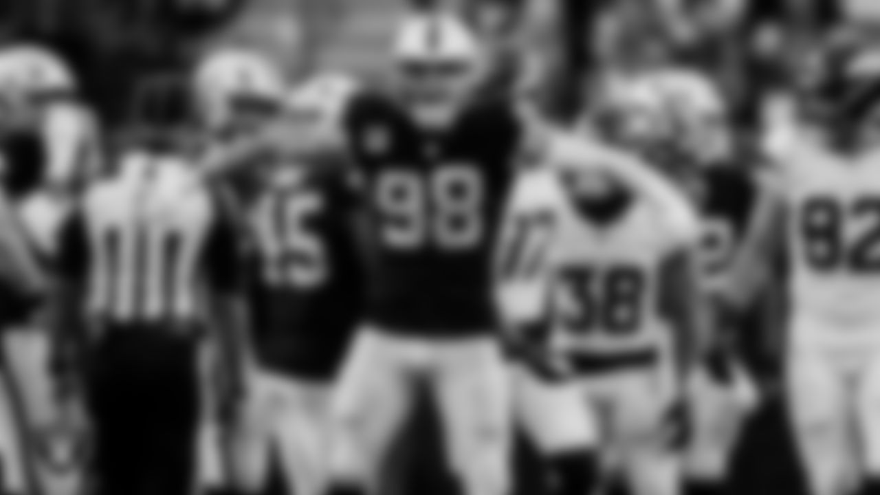 Las Vegas Raiders defensive end Maxx Crosby (98) celebrates after making a tackle during the regular season home game against the Denver Broncos at Allegiant Stadium.