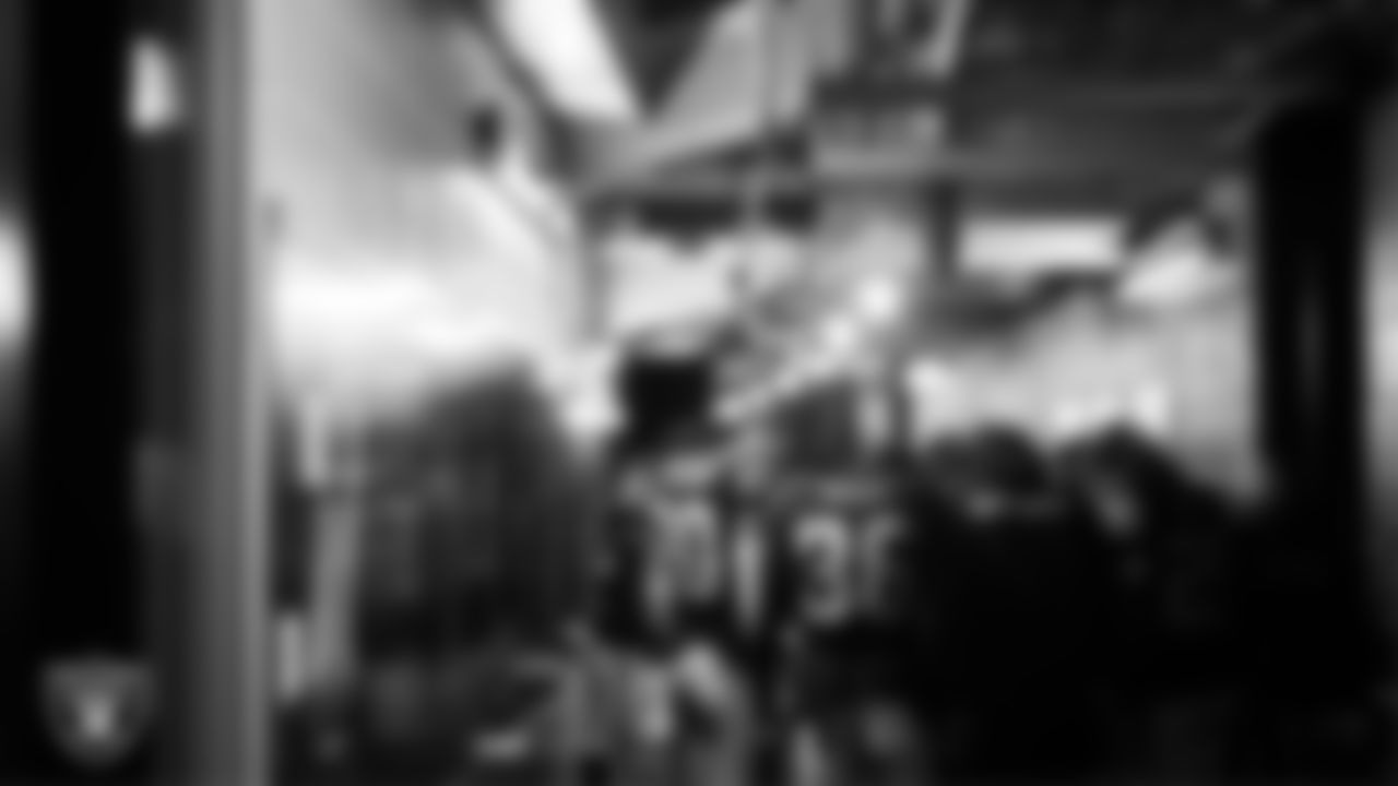 The Las Vegas Raiders defensive backs huddle in the tunnel before the regular season home game against the Jacksonville Jaguars at Allegiant Stadium.