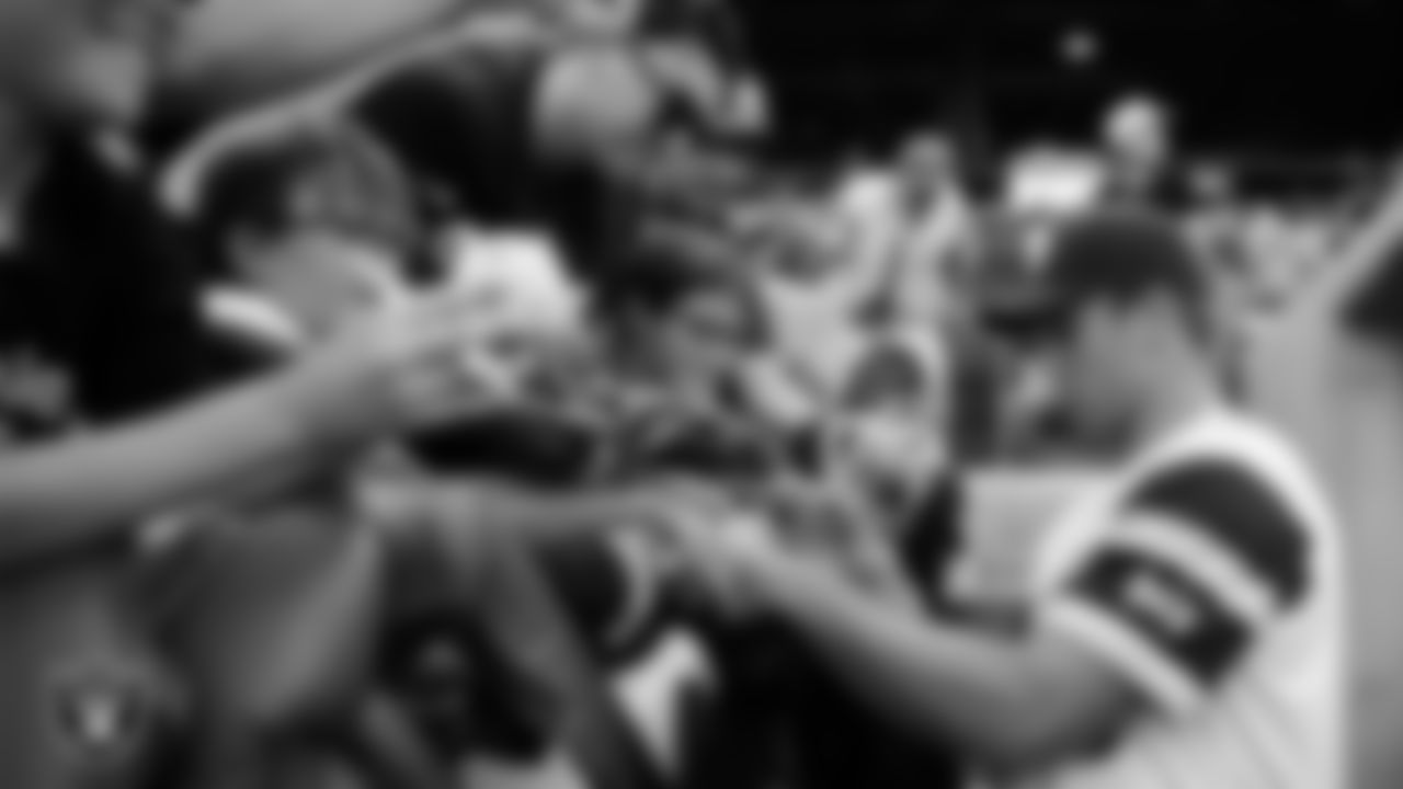 Las Vegas Raiders tight end Brock Bowers (89) signs autographs before the Battle For Vegas at Las Vegas Ballpark.