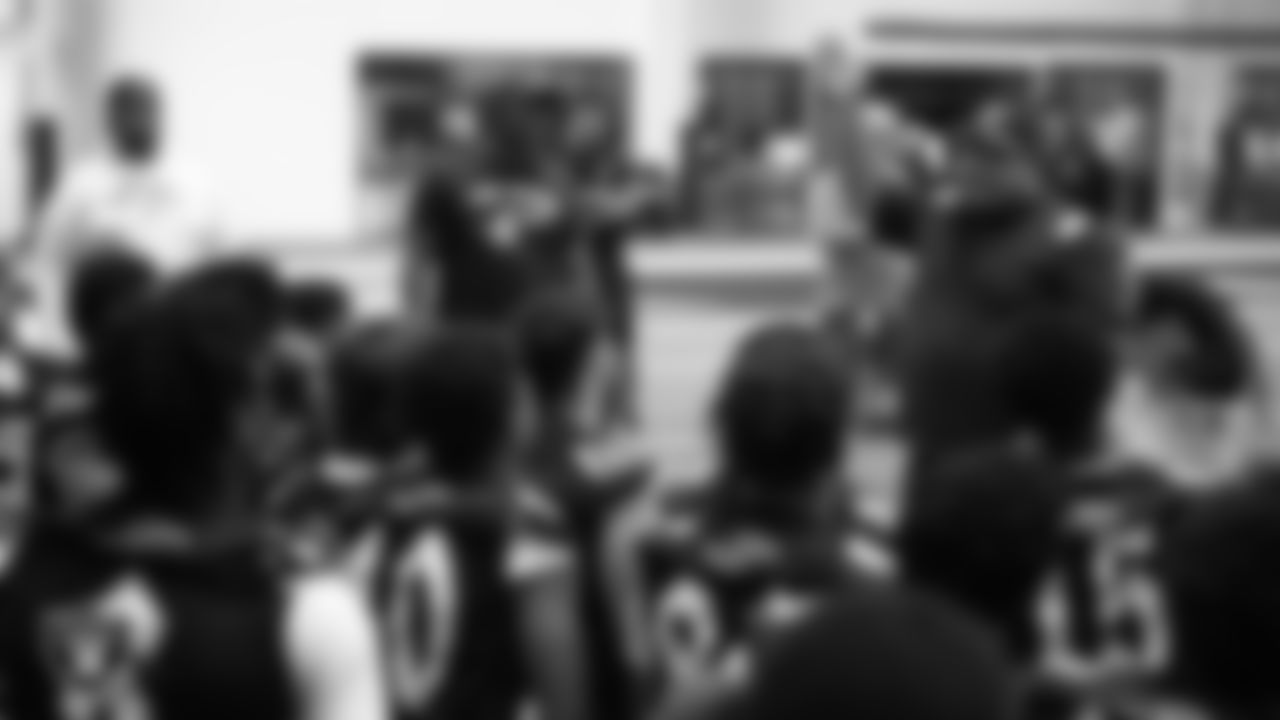 Las Vegas Raiders senior manager of football development Jordan Aguilar speaks to the Cheyenne High School football team before a walkthrough at Intermountain Health Performance Center.