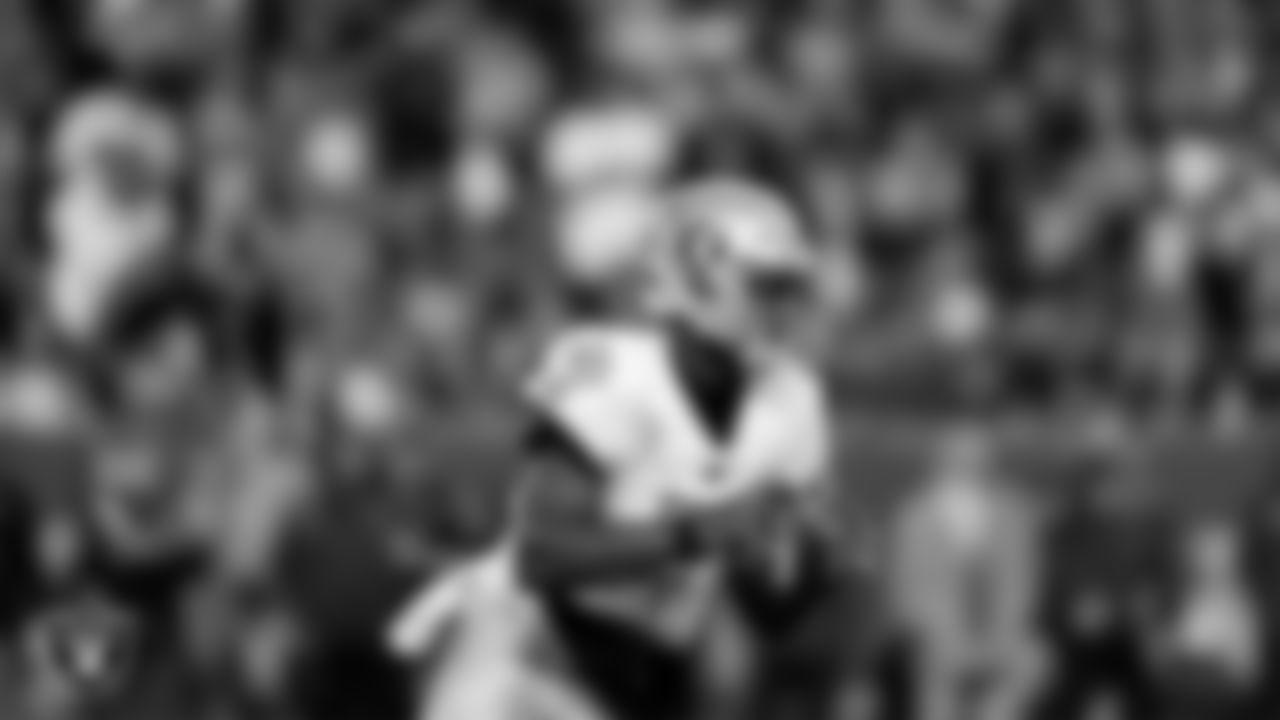 Las Vegas Raiders quarterback Geno Smith (7) during the regular season away game against the Denver Broncos at Empower Field at Mile High.