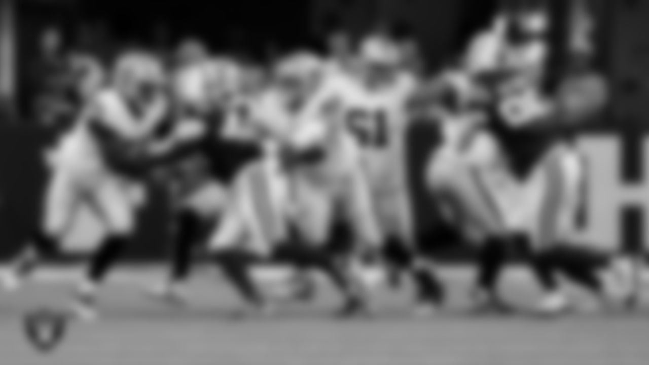 Las Vegas Raiders tackle DJ Glaze (71), center Jackson Powers-Johnson (58) and center/guard Jordan Meredith (61) during the regular season away game against the Indianapolis Colts at Lucas Oil Stadium.