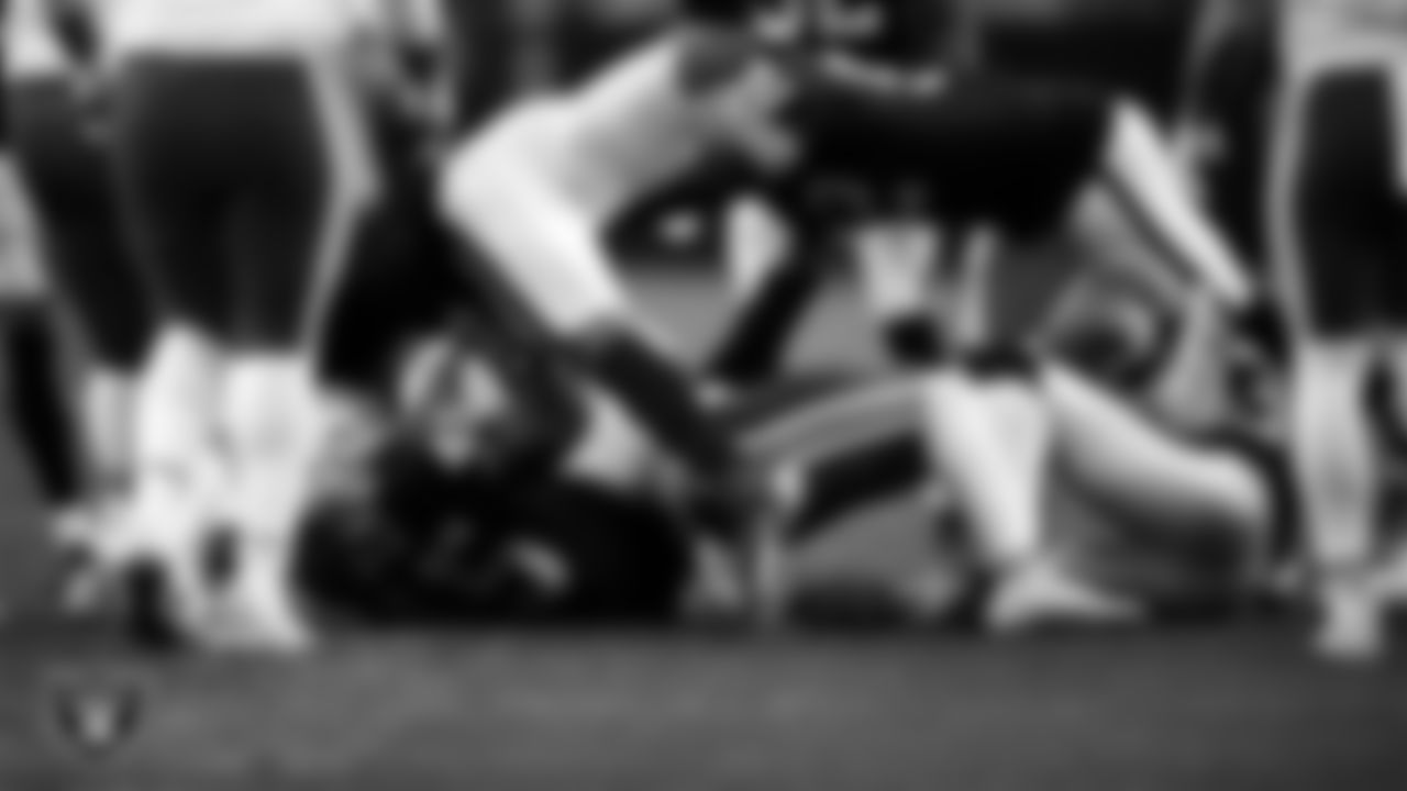 Las Vegas Raiders linebacker Devin White (45) makes a tackle during the regular season home game against the Kansas City Chiefs at Allegiant Stadium.