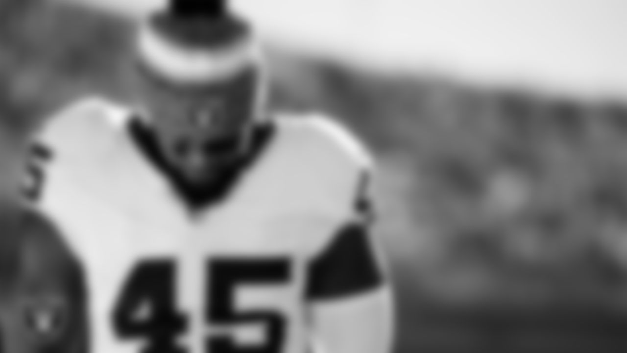 Las Vegas Raiders linebacker Devin White (45) during the national anthem before the regular season away game against the Kansas City Chiefs at GEHA Field at Arrowhead Stadium.
