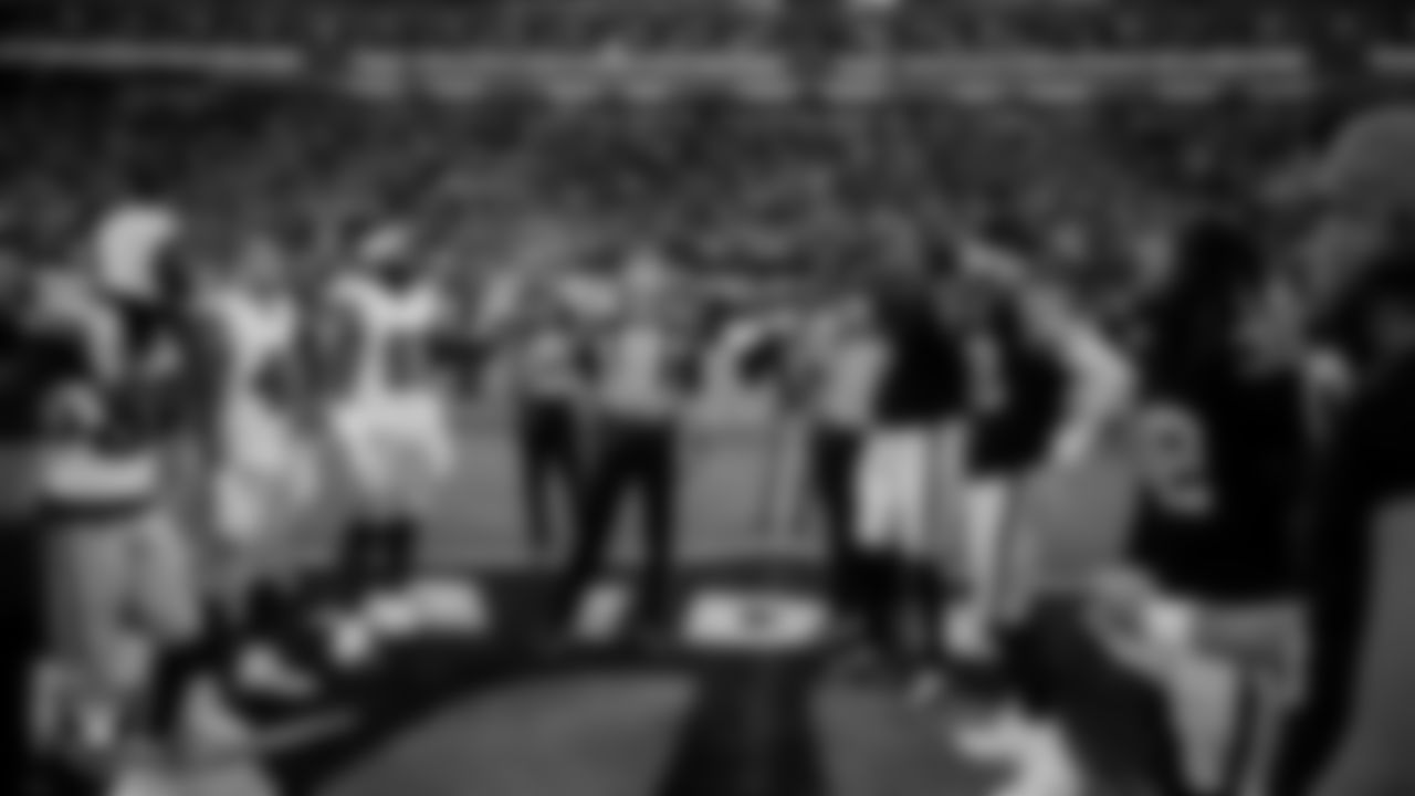 The Las Vegas Raiders during the coin toss before the regular season home game against the Dallas Cowboys at Allegiant Stadium.