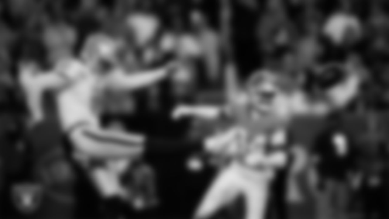 Las Vegas Raiders punter AJ Cole (6) punts during the regular season away game against the Denver Broncos at Empower Field at Mile High.