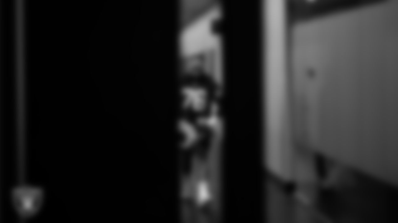 Las Vegas Raiders guard Caleb Rogers (76) walks out to the field for practice at Intermountain Health Performance Center.