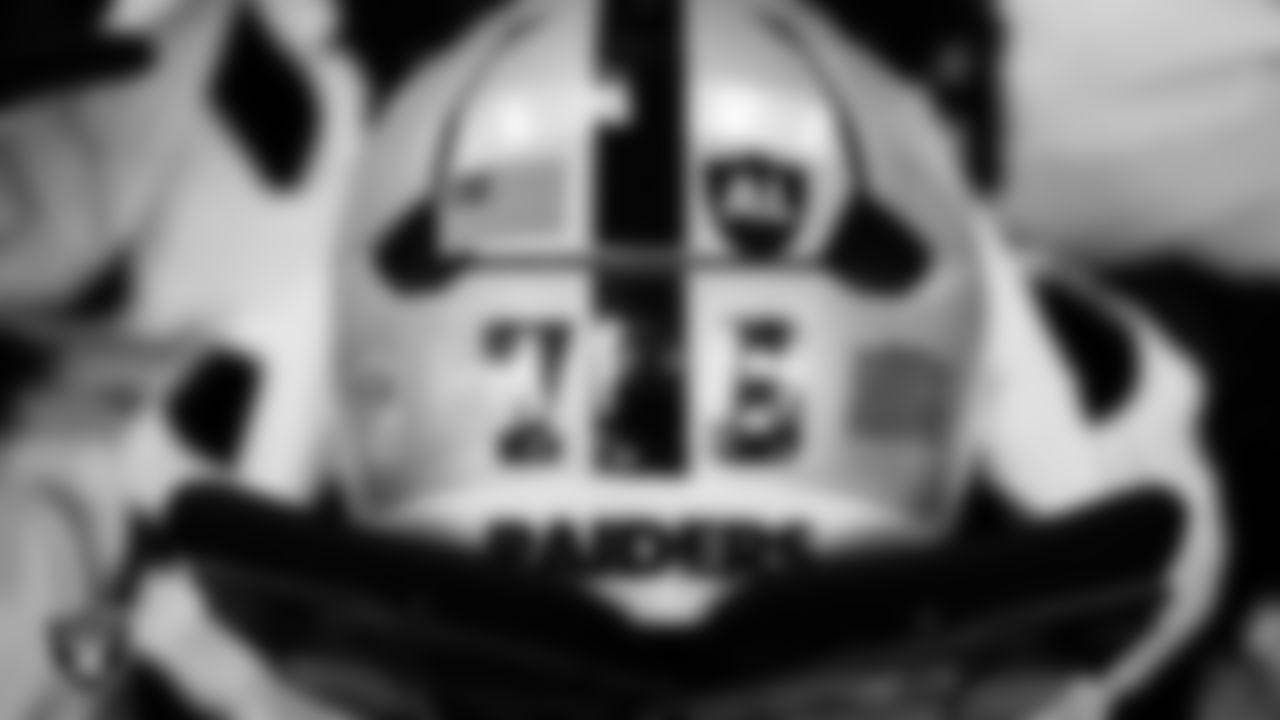 Las Vegas Raiders guard Caleb Rogers' (76) helmet in the locker room prior to the Raiders' arrival for their preseason away game against the Seattle Seahawks at Lumen Field.