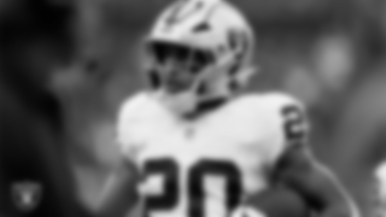 Las Vegas Raiders safety Isaiah Pola-Mao (20) after intercepting a pass during the preseason away game against the Seattle Seahawks at Lumen Field.