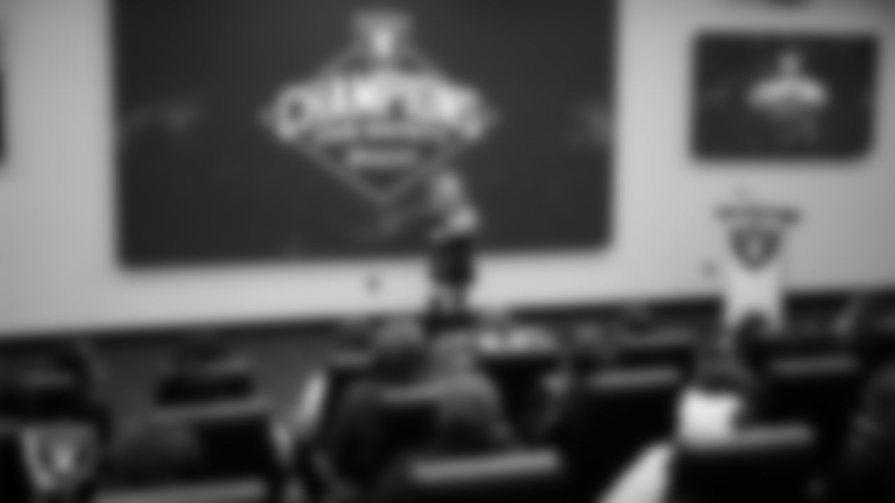 Ellie Naqvi from Naqvi Injury Law speaks to athletes from Clark High School and Chaparral High School at Intermountain Health Performance Center.