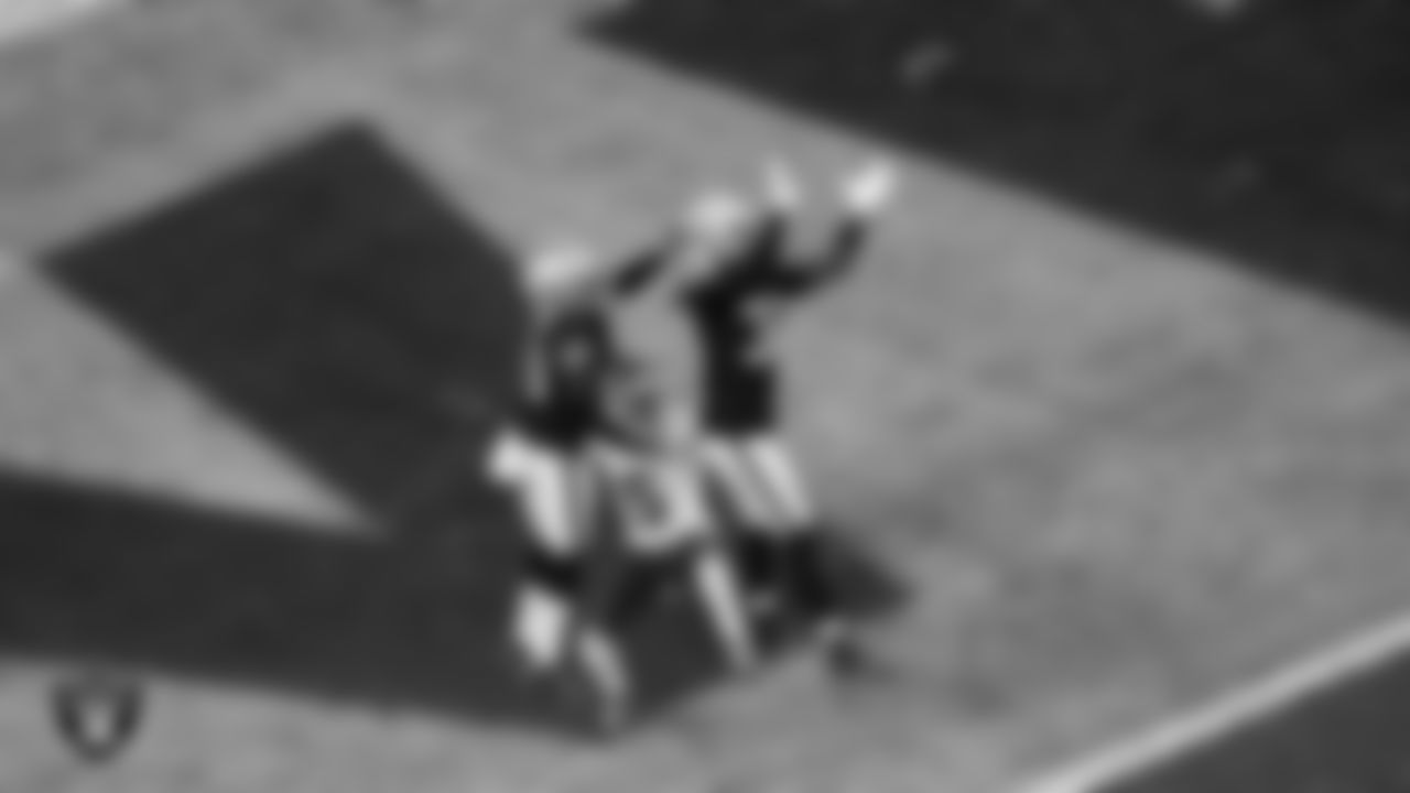 Las Vegas Raiders safety Lonnie Johnson Jr. (32) breaks up a pass during the regular season home game against the Kansas City Chiefs at Allegiant Stadium.