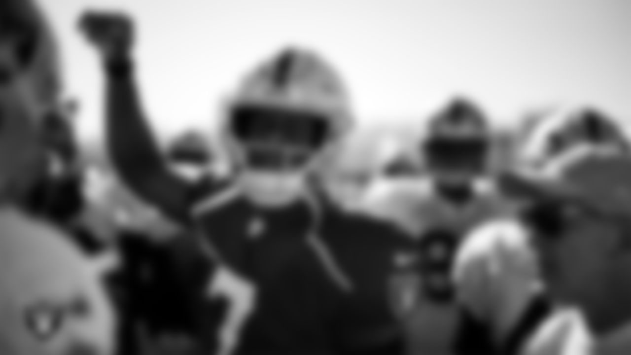 Las Vegas Raiders quarterback Geno Smith (7) leads a huddle on the field for a joint practice with the San Francisco 49ers at 2025 Training Camp at Intermountain Health Performance Center.