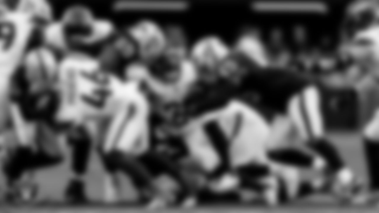 Las Vegas Raiders defensive tackle Adam Butler (69) and linebacker Devin White (45) during the regular season home game against the Denver Broncos at Allegiant Stadium.