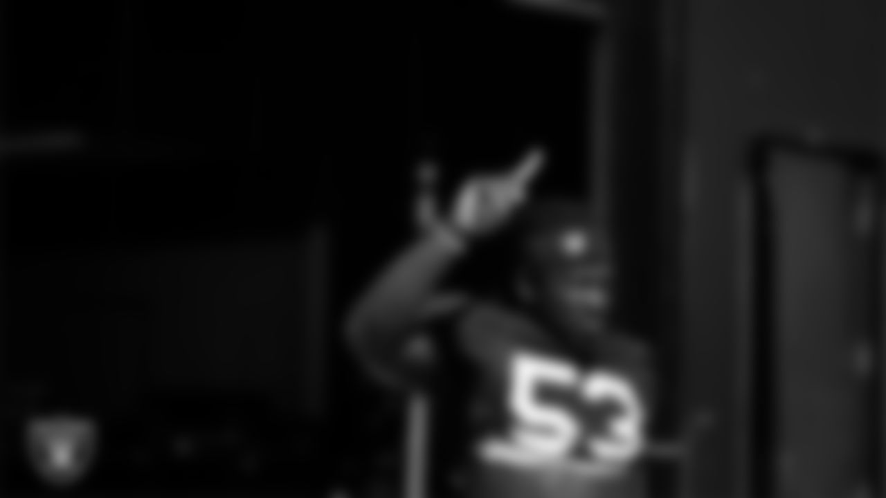 Las Vegas Raiders linebacker Brian Asamoah II (53) walks out to the field for practice at Intermountain Health Performance Center.